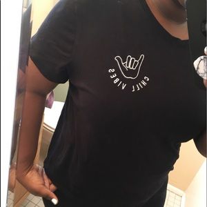 Short sleeve top with “Chill Vibes” on the front